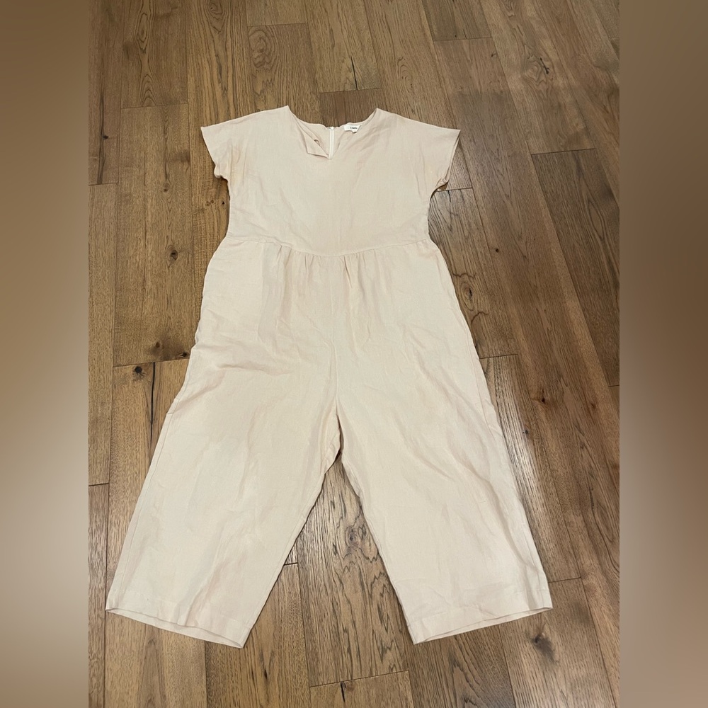 A mente peachy tan line jump suit in size Medium Large